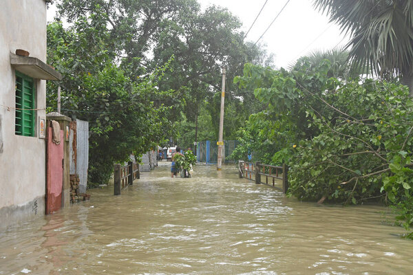 Burdwan Town, Purba Bardhaman District, West Bengal / India - 31.07.2021: Several areas of Burdwan town have been inundated by heavy rains and Banka rivulet water.