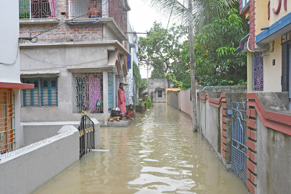 Burdwan Town, Purba Bardhaman District, West Bengal / India - 31.07.2021: Several areas of Burdwan town have been inundated by heavy rains and Banka rivulet water.