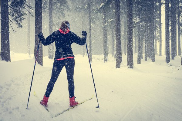Cross country skiing in bad weather.