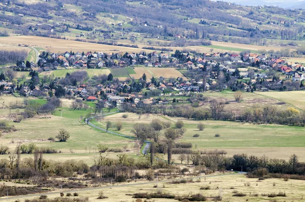 Sunny landscape of a small village from slightly above — Stok fotoğraf