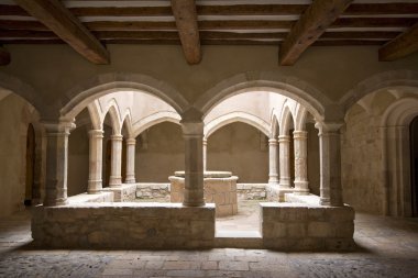 Cloister in Santes Creus monastery clipart