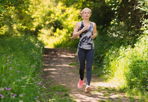 Young Blonde Girl Wearing Sportswear Running Nature Morning Healthy Lifestyle — Stock Photo, Image