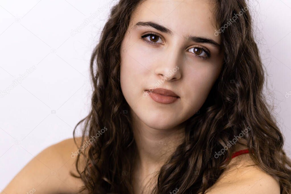 Portrait of a beautiful teen brunette girl