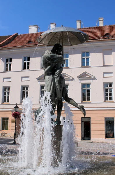 FOUNTAIN MAN AND WOMAN KISSING Stock Photo