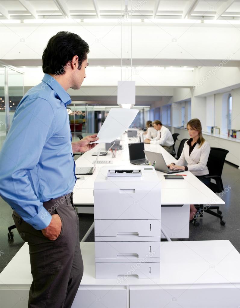 worker with copy machine in office