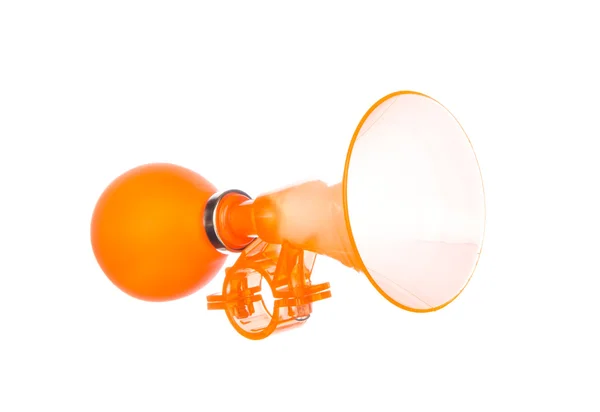 Orange toy trumpet isolated on white — Stock Photo, Image