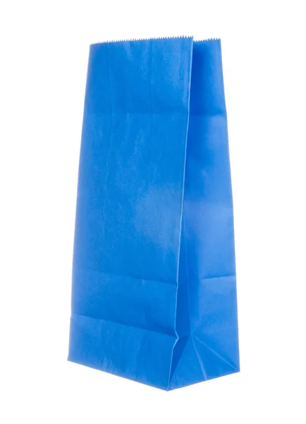 白で隔離される青い紙バッグ — ストック写真
