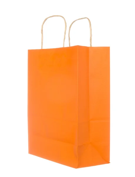 Bolsa de papel naranja vacía aislada en blanco — Foto de Stock