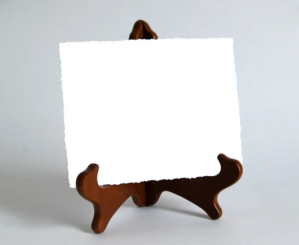 Wooden stand with blank paper card — 图库照片