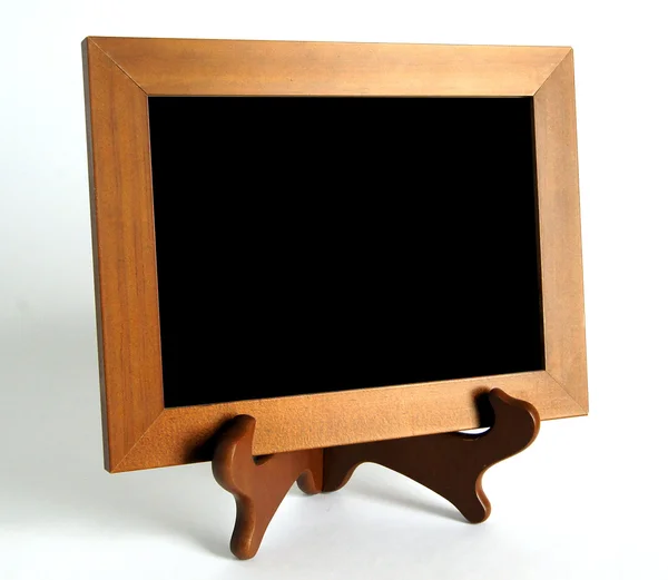 Wooden stand with picture frame — Stock Fotó