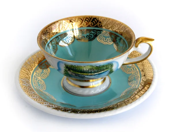 Antique porcelain cup and saucer — Stock Photo, Image