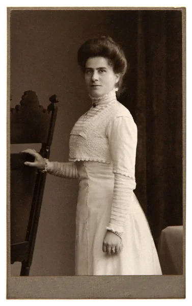 Vintage photo: young woman posing in studio — Stock Photo, Image