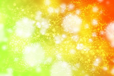 Yeşil ve turuncu arka planda parlak bokeh