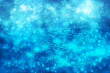 Yeşil ve mavi arkaplanda parlak bokeh