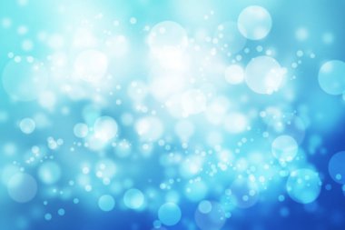Mavi arkaplanda parlak bokeh