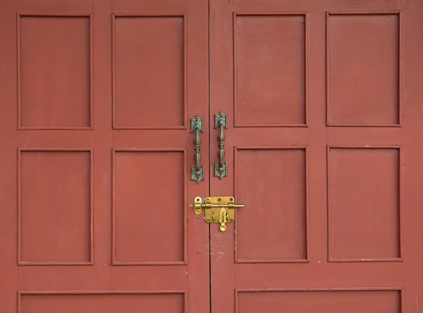 Red door with lock — Stock Photo, Image