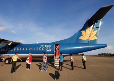 Vietnam Airlines plane taxis in Con Dao island clipart
