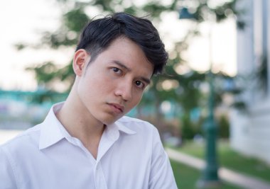 Close up portrait, stressed young man