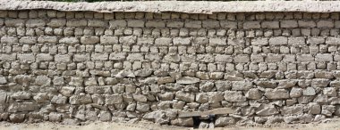 Abstract stone wall structure in Ladakh