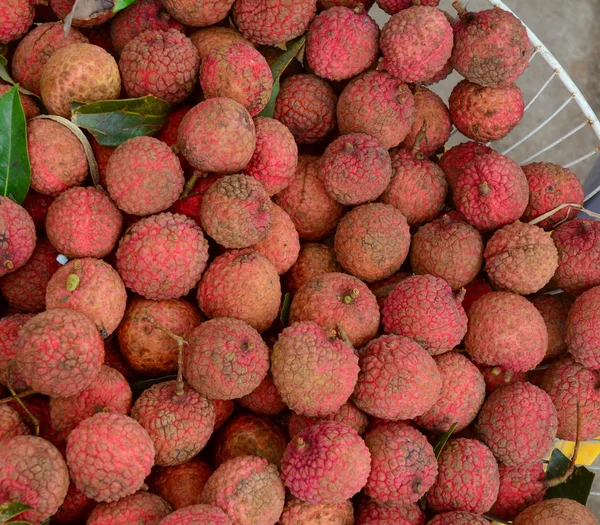 Many lychees at a market stall in Mekong Delta — Stock Photo, Image