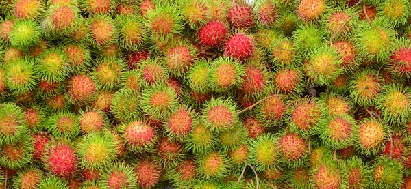 Rambutan fruits at a market in Mekong Delta — Stock Photo, Image