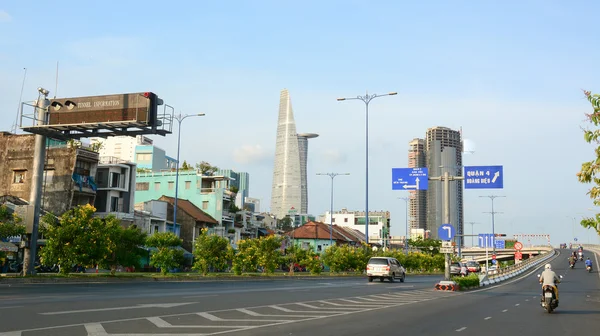 Architecture, traffic, ads in Saigon — Stock Photo, Image