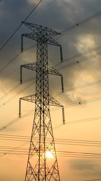 Electricity pillar in sunset — Stock Photo, Image