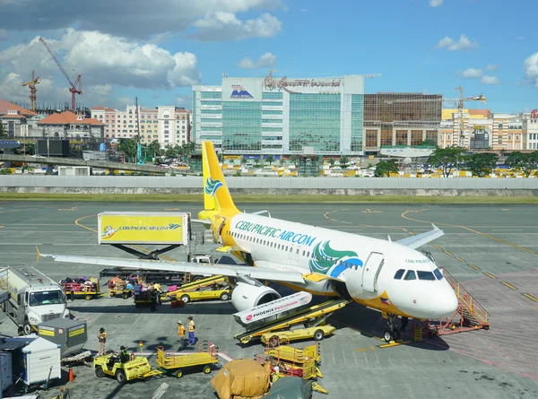 Cebu Pacific estacionamiento de aviones en Manila aeropuerto Fotos De Stock Sin Royalties Gratis