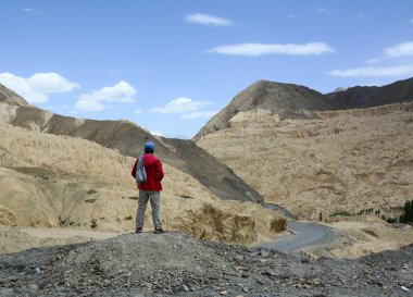 Asian traveler enjoying mountain view