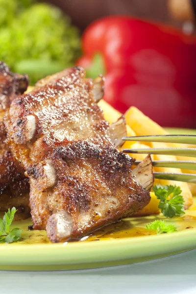 Grilled ribs on plate — Stock Photo, Image