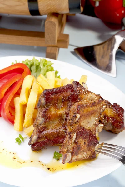 Grilled ribs on plate — Stock Photo, Image