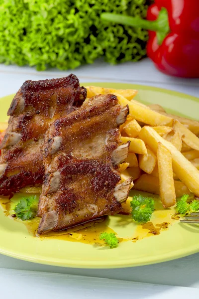 Grilled ribs on plate — Stock Photo, Image