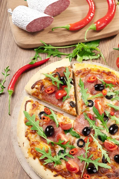 Pizza peperoni on plate Royalty Free Stock Photos