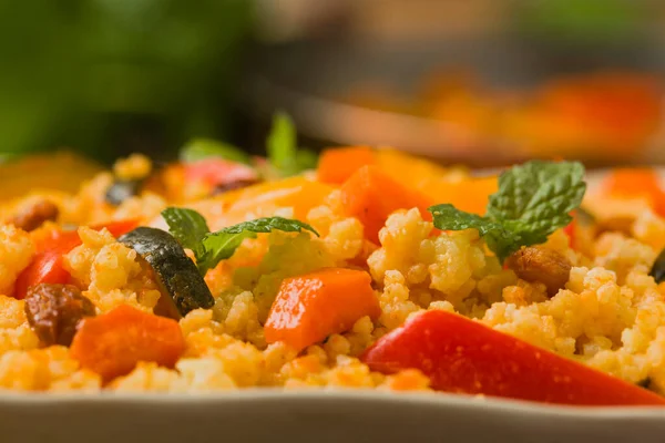 stock image Millet with vegetables and raisins. Front view. Close up. 