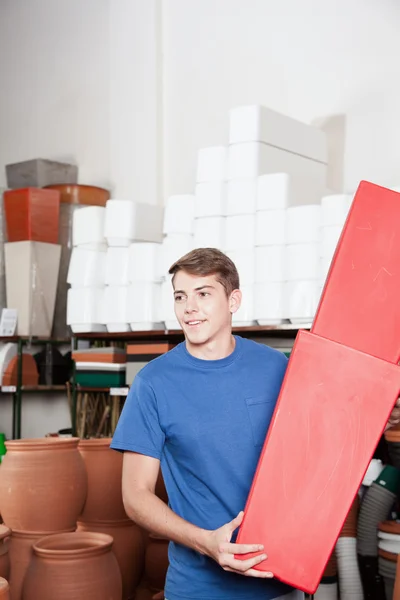 Man holding flower pots — Stock Photo, Image