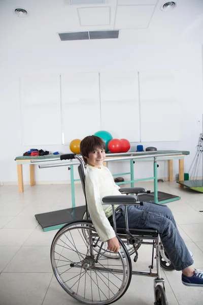 Boy in wheelchair on rehabilitation — Stock Photo, Image