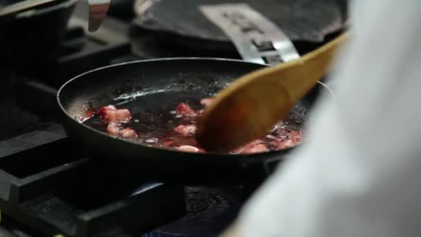 Boiling strawberries in  kitchen — Stock Video