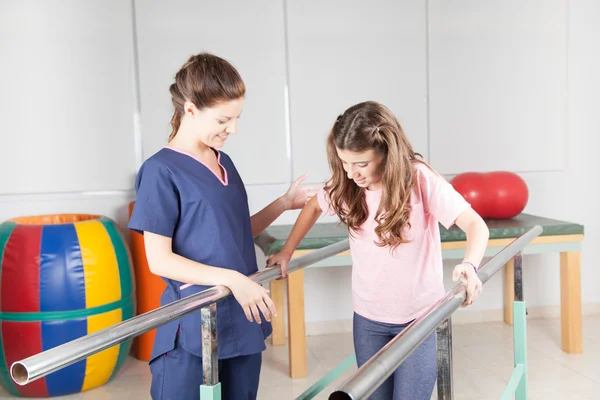 Therapist with patient on rehabilitation Stock Image