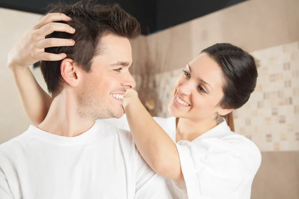 Cheerful couple in the bathroom — Stock Photo, Image