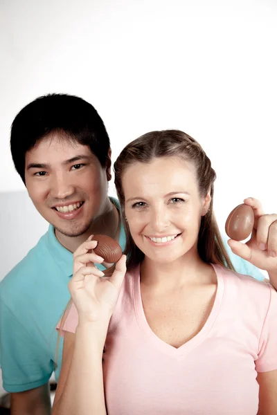 Couple with easter eggs — Stock Photo, Image