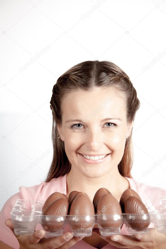 woman holding easter eggs