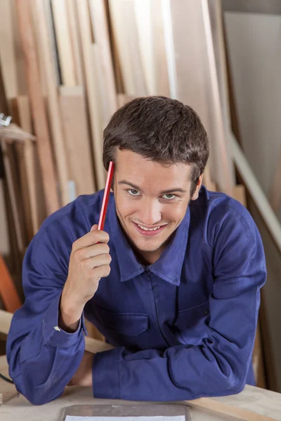 Guy holding a pencil — Stock Photo, Image