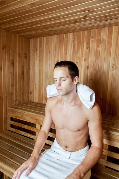 Guy relaxed inside the sauna — Stock Photo, Image