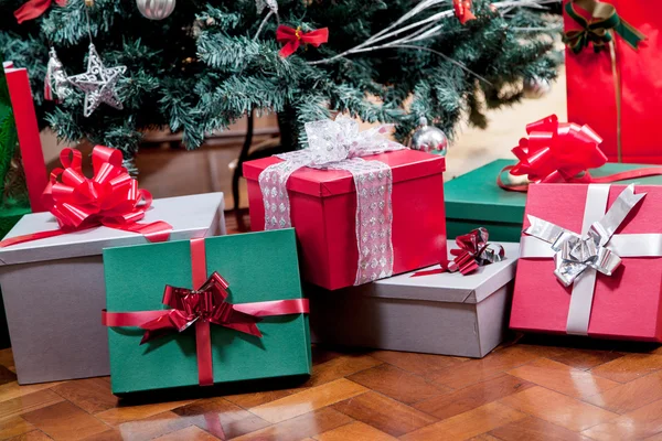 Gifts under christmas tree — Stock Photo, Image