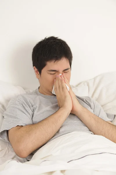 Man blowing his nose — Stock Photo, Image