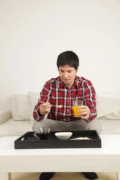 Man having a breakfast — Stock Photo, Image