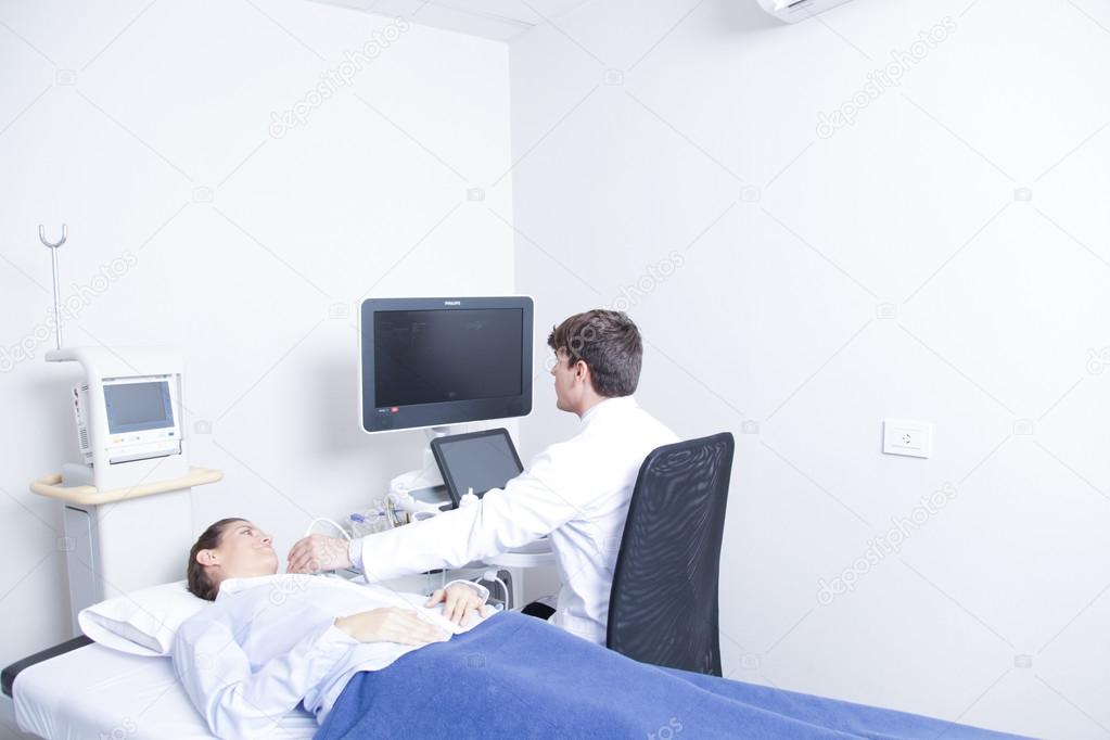 Doctor doing a doppler sonography