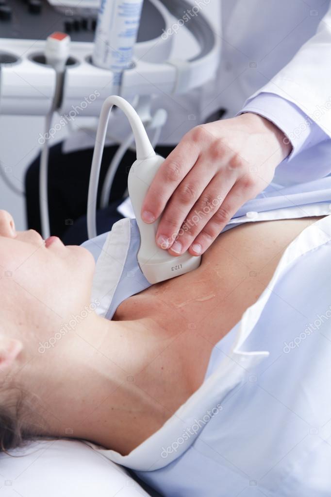 Doctor doing a doppler sonography