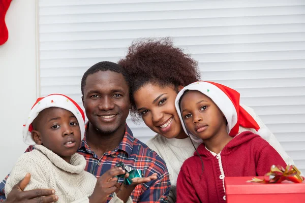 Family of four at Christmas — Stock Photo, Image