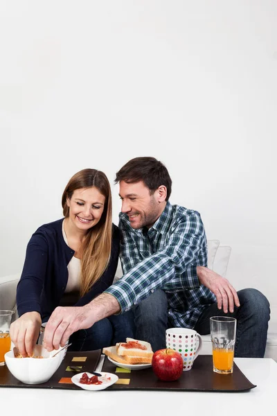 Beutifull couple having a breakfast — Stock Photo, Image